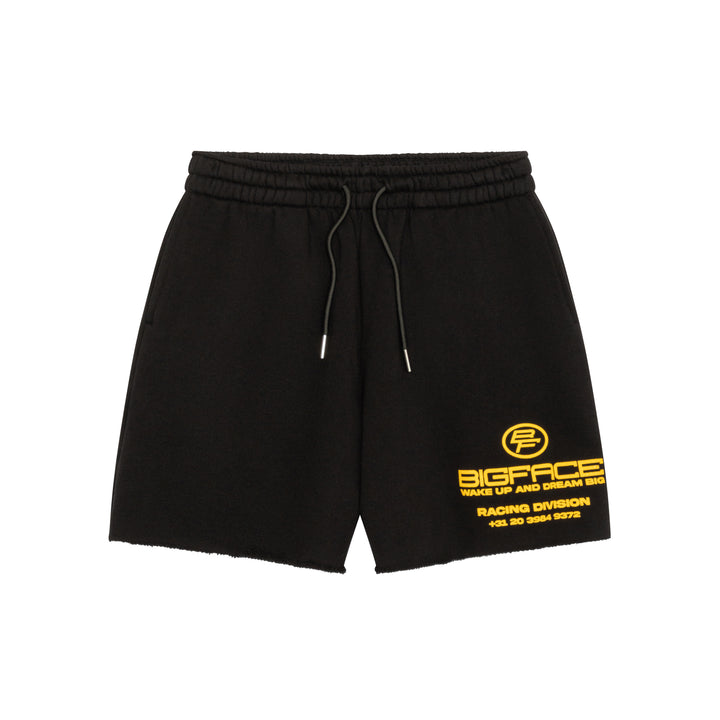 Unisex black athletic shorts with yellow BIGFACE branding on a white background