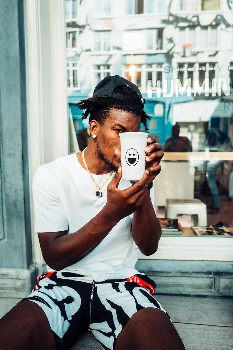 Jimmy sipping from a BIGFACE cup